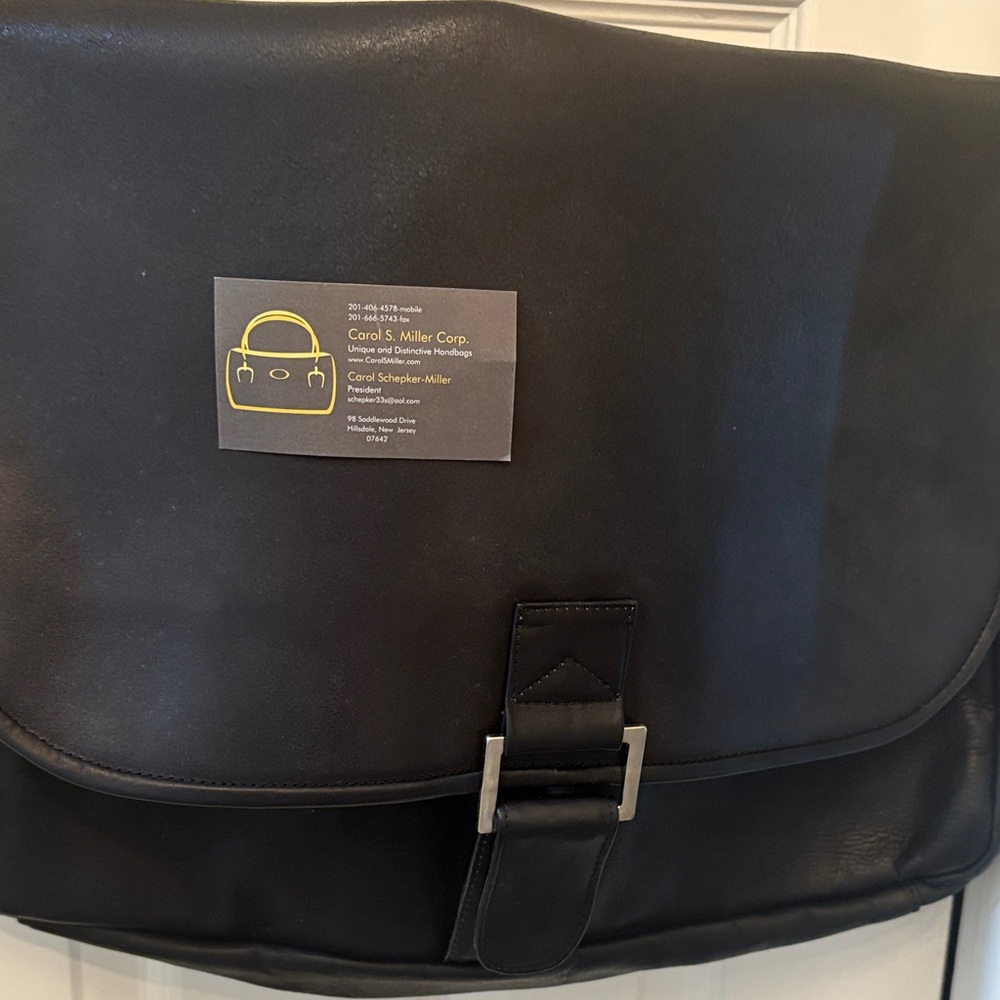 New, black, leather laptop bag